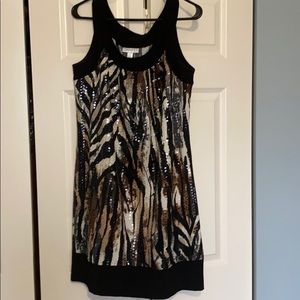 Women’s cocktail dress with sequins/animal print.